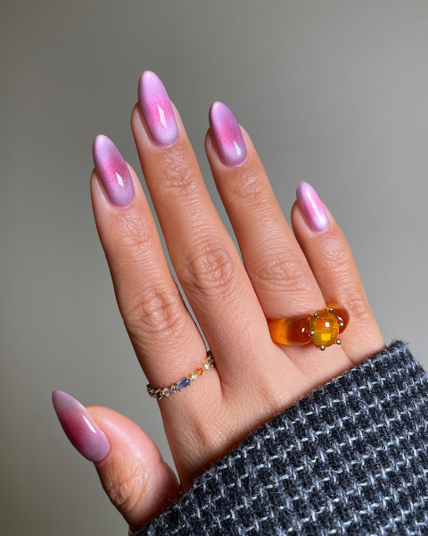 Close up of a pink velvet manicure